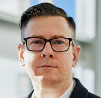 Photo d'Alexander Hughes, PDG d'une entreprise spécialisée dans le trading de cryptomonnaies